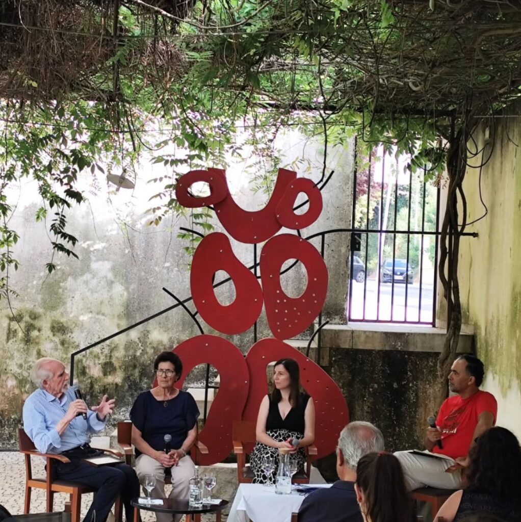 A public conversation beside the Baci Sospesi installation at Museu Moinho do Papel in Leiria.