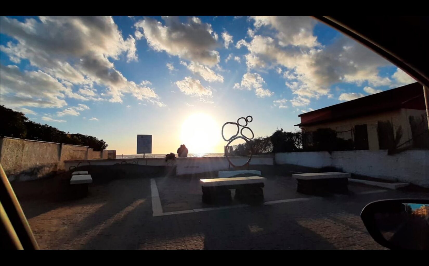 The Baci Sospesi installation in Passoscuro at sunset.