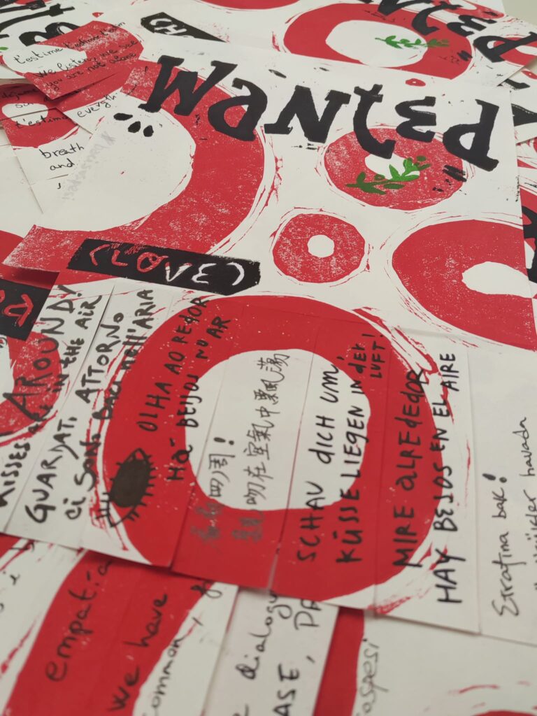 Several handprinted Baci Sospesi flyers from the Berlin Sprouting Lab, including Wanted love, with red kisses and multilingual tear-off messages.